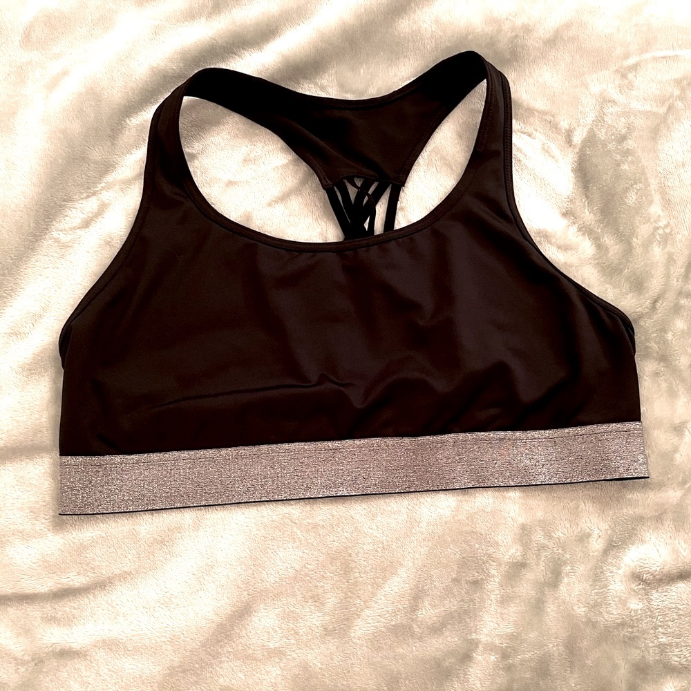 Victoria Secret sports bra in black with silver detail. Size XL